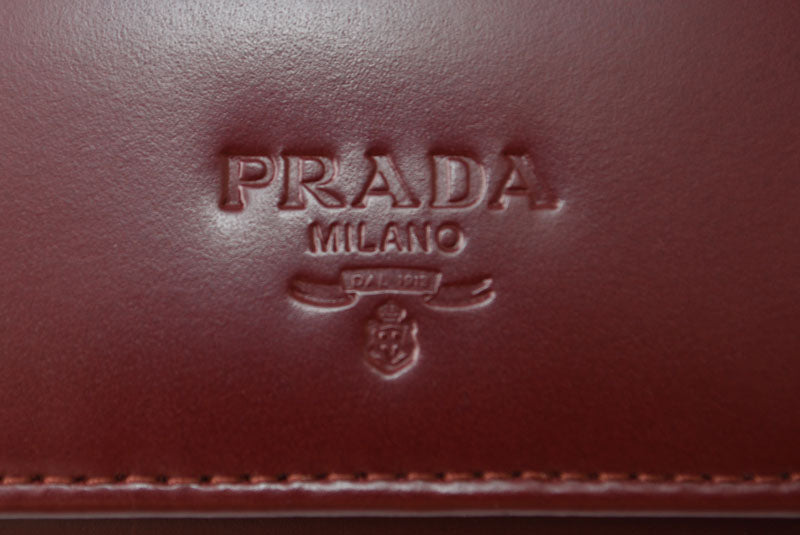 プラダ キーケース/キーホルダー PRADA 6連 レザー ボルドー ワインレッド ロゴ刻印 レディース メンズ 【中古】