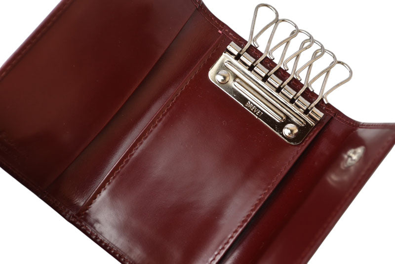 プラダ キーケース/キーホルダー PRADA 6連 レザー ボルドー ワインレッド ロゴ刻印 レディース メンズ 【中古】