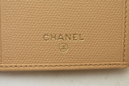シャネル 美品 財布 ココボタン 二つ折り長財布 レザー ベージュ レディース CHANEL 財布【中古】