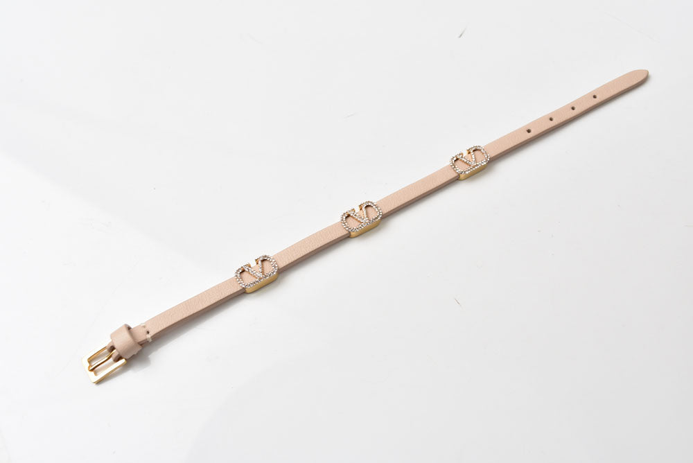 ヴァレンティノ 美品 バングル/ブレスレット VALENTINO バレンチノ Vロゴ スワロフスキー ベージュ【中古】