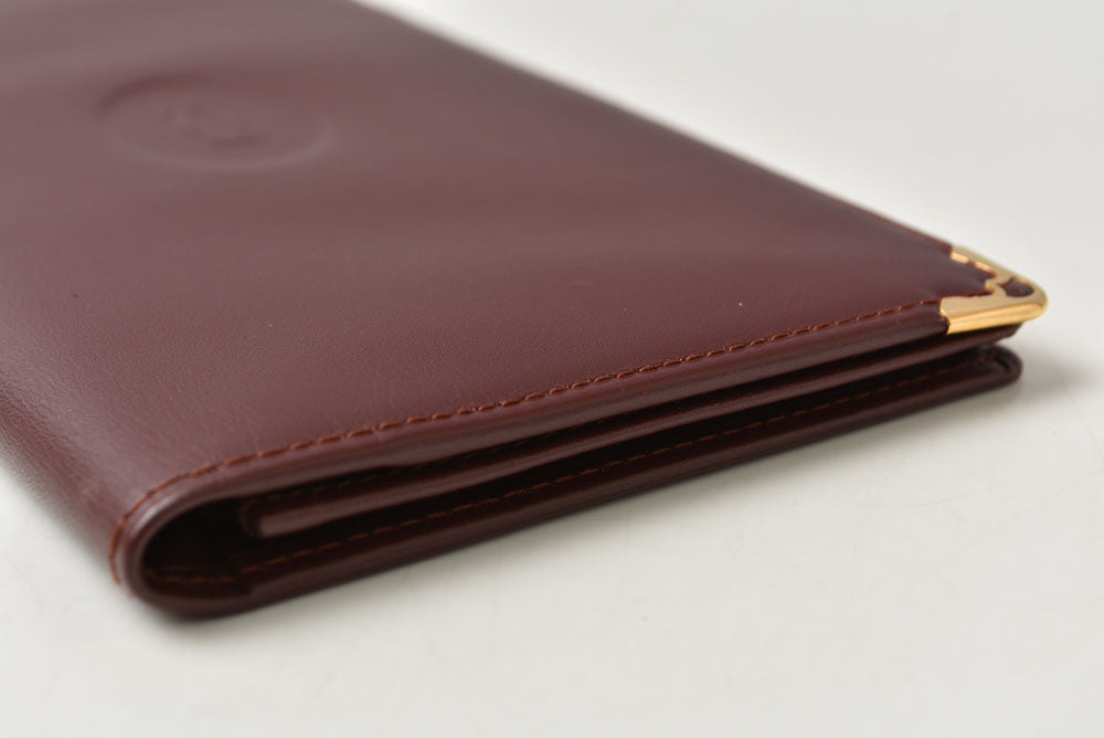 カルティエ 財布/札入れ メンズ Cartier 長財布 型押しレザー マスト ドゥ カルティエ ボルドー【中古】