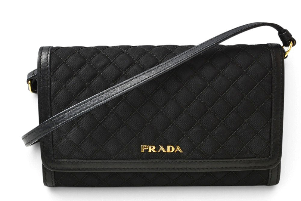 プラダ ショルダーバッグ/マルチウォレット PRADA 二つ折り ストラップ付長財布 1M1437 NERO ブラック 黒 レザー レディース 【中古】