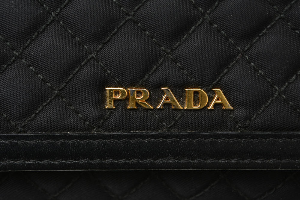 プラダ ショルダーバッグ/マルチウォレット PRADA 二つ折り ストラップ付長財布 1M1437 NERO ブラック 黒 レザー レディース 【中古】